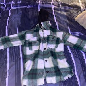 No boundaries, (colors- green, black, and white), size small.